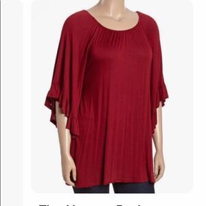 The hanger size medium women’s tunic long sleeves